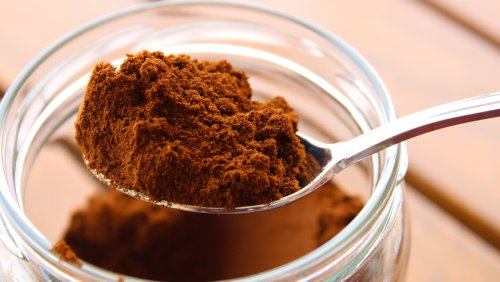 Why You Should Look Into Keeping A Jar Of Coffee Grounds On Your Patio