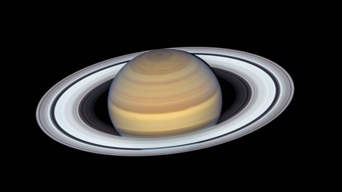Saturn: Giant Rings and a Moon Full of Space Lakes