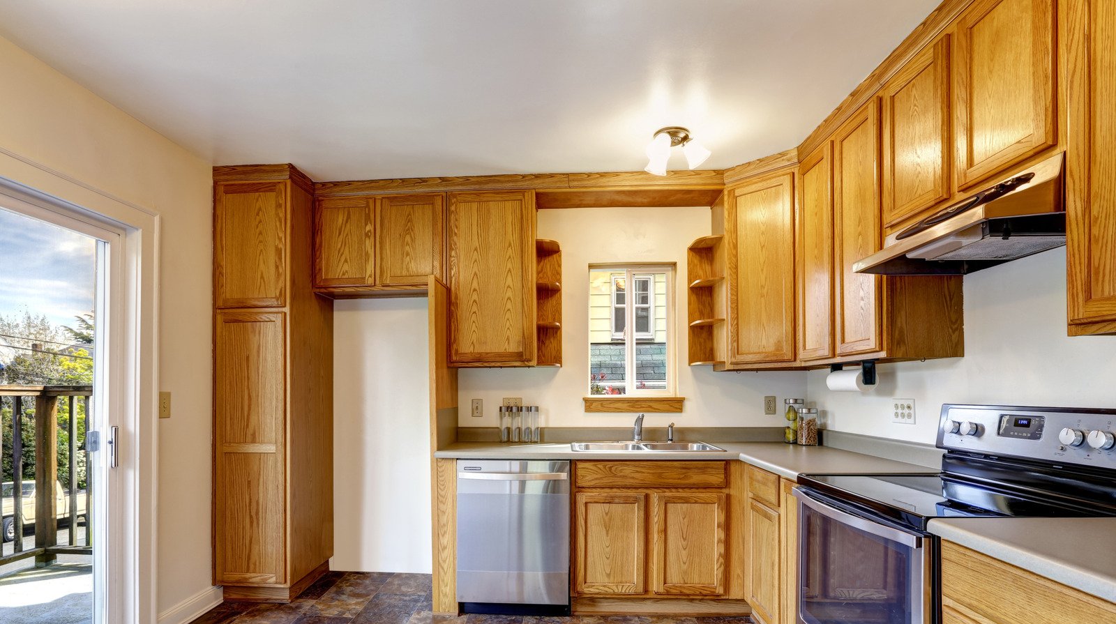 Give Outdated Honey-Toned Cabinets A Fresh New Look With An Affordable Product