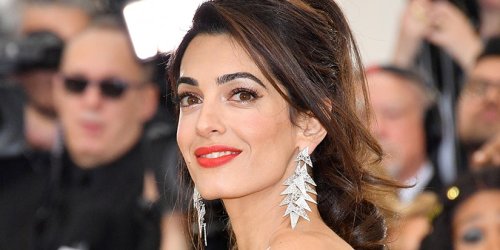 Amal Clooney Switches Out Her Signature "Espresso Brown" Hair Color for a "Hot Chocolate" Winter Update