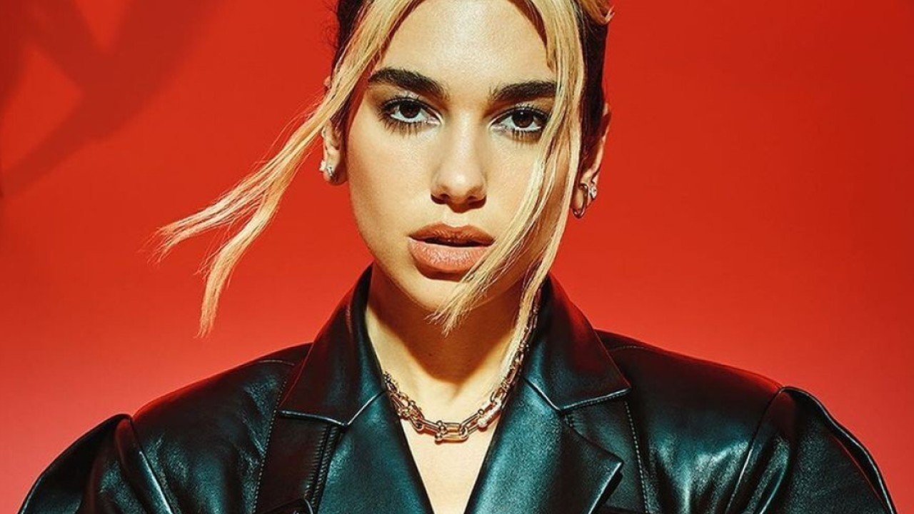 How Dua Lipa spends her millions – Jaguar cars, Chanel and Versace clothes, and Swarovski manicures