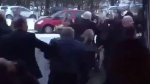 Watch the shocking moment a mass brawl breaks out at a Glasgow funeral