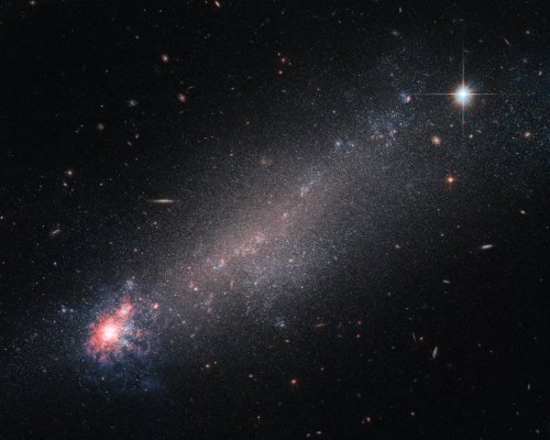 Hubble Spies NGC 4861: A Distant Wolf-Rayet Galaxy That Defies Classification