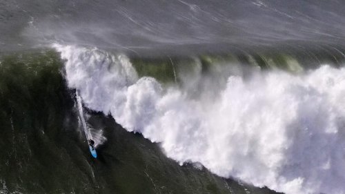 Peter Mel drops in on A 50 ft MONSTER WAVE for a ride at Mavericks!