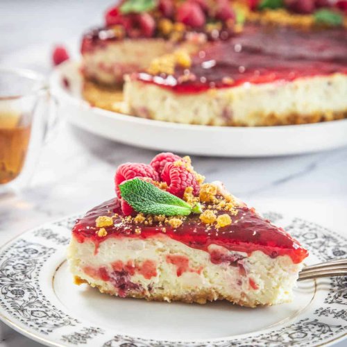 When life gives you raspberries, bake a raspberry ricotta cheesecake—light, creamy, and impossible to resist!