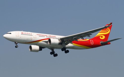 Hong Kong flight makes emergency landing after fire in overhead compartment