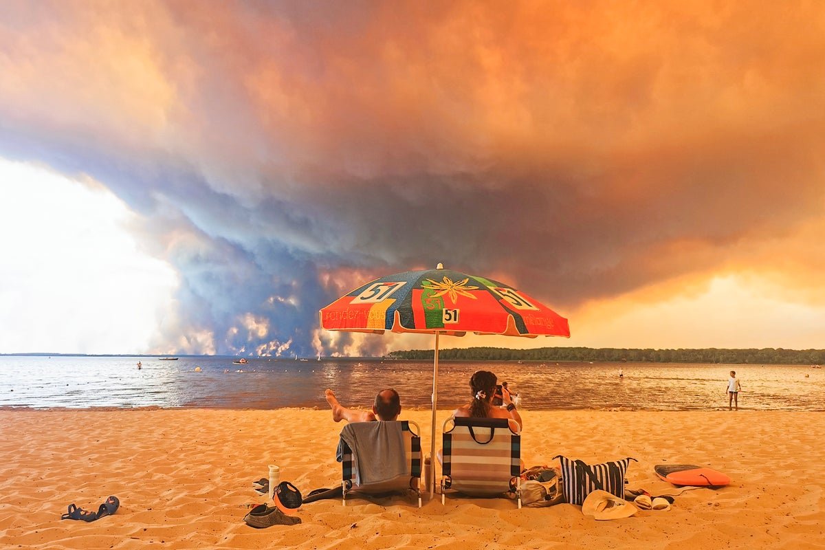 Wildfires force 80,000 to flee in France and Spain as Cap Ferret evacuated
