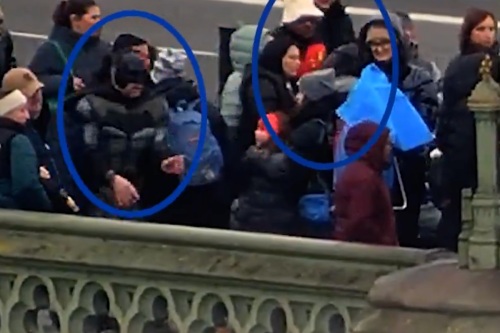 Police officers dress up as Batman and Robin in bizarre undercover sting on Westminster Bridge rogue traders