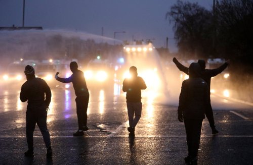 Rioting youths in Belfast clapped by adults as fears grow of spiralling unrest