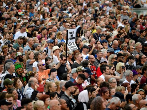 Thousands of anti-vaccine protesters gather in London