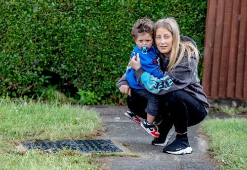 ‘I thought he was dead’: Mother jumped into open sewer to save toddler son who fell 20ft when manhole collapsed