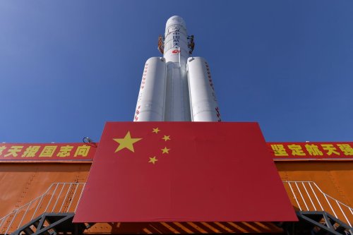 China positions rocket ahead of ambitious mission to the moon for first time in four decades