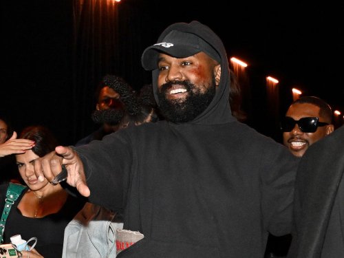 White robes and ‘condom’ stockings: Kanye West and wife cause confusion