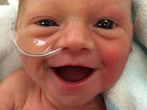 Premature baby girl wins title of 'happiest baby in the world' just five days after being born | The Independent