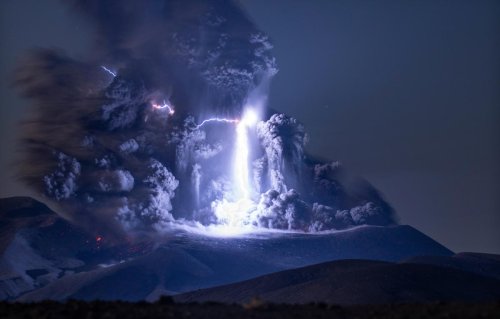 Lightning bolt strikes erupting volcano in extraordinary image