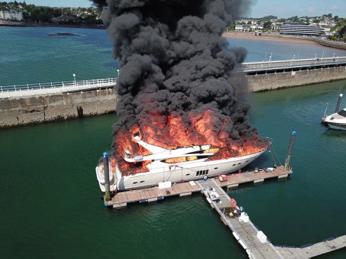 £6million Superyacht sinks after it went up in flames at Torquay harbour