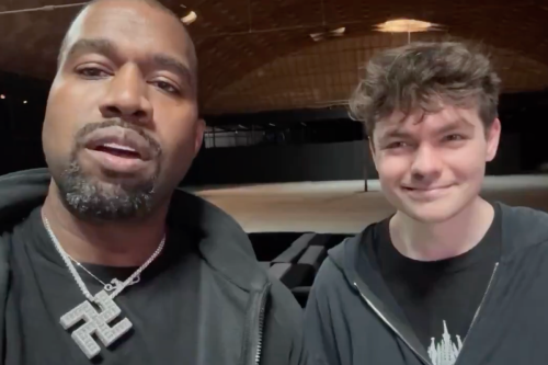 Kanye poses in a swastika chain with white supremacist Nick Fuentes