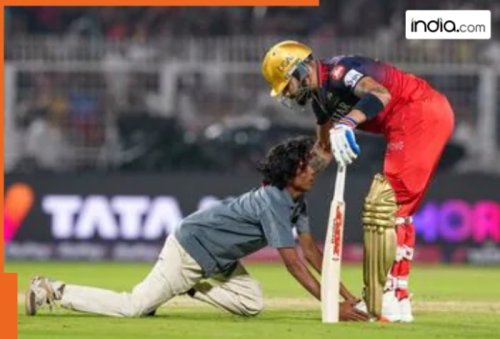 KKR vs RCB: Virat Kohli fan breaches Eden Gardens security, falls to star cricketer’s feet during IPL 2025 opener, video goes viral