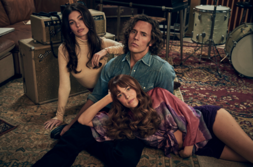 ‘Daisy Jones & The Six’ First Look: Riley Keough and Sam Claflin Fall in Love as 1970s Songwriters