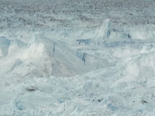 Watch A Mile Of 3,000-Foot-High Ice Fall Into The Ocean