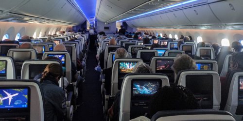 I never thought I'd pay extra for business class — now I swear by the upgrade's incredible value