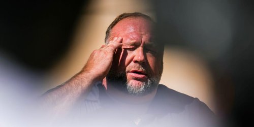 Alex Jones, who mocked Sandy Hook families and swore they'd never be paid, says he has less than 1% of what he owes them