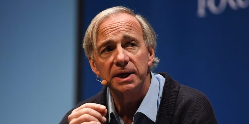 Billionaire investor Ray Dalio says stocks still aren't pricing in the Fed pushing rates near a 'very harmful, very damaging' level