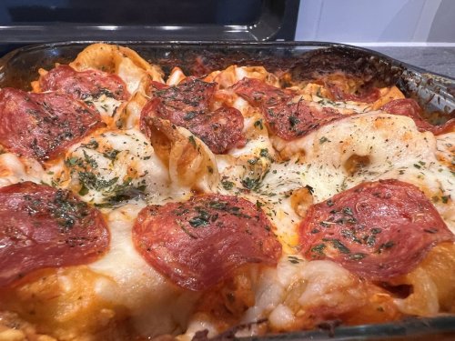 I tried the pizza pasta dish that's taken over TikTok despite costing $30 to make. I may never be able to eat cheese again.
