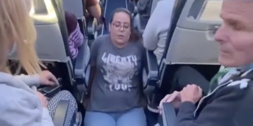 A wheelchair user filmed herself dragging her body to the bathroom on a plane after the cabin crew refused to help