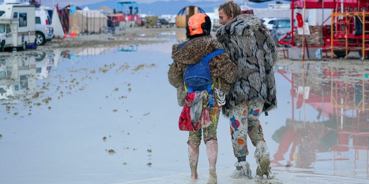 Don't hike out of Burning Man in the mud say some people who have hiked out of Burning Man in the mud