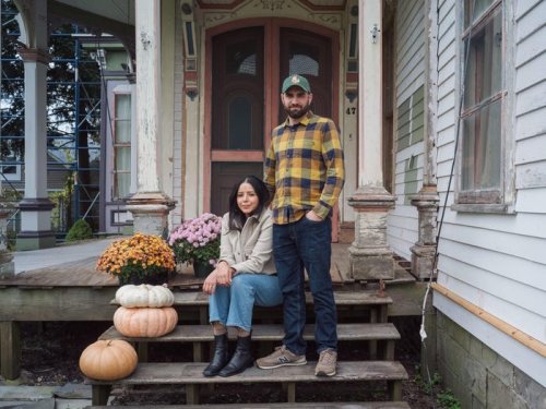 A millennial couple considered hundreds of houses — then spent $150,000 on a falling-apart Victorian sight unseen. They think it's worth it.