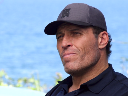Tony Robbins started out as a broke janitor — then he saved a week's worth of pay, and the way he spent it changed his life