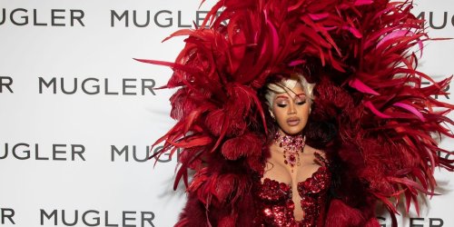 An artist is considering legal action against Cardi B for her butt-baring Halloween costume
