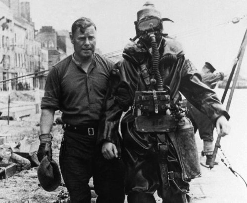 A group of WWII-era scientists used themselves as guinea pigs to learn to breathe underwater. Their experiments helped make D-Day possible.