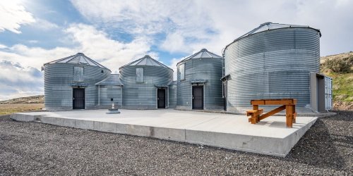 A hunter paid $100,000 for 4 old grain bins in the middle of nowhere, then transformed them into a secret home. See inside.