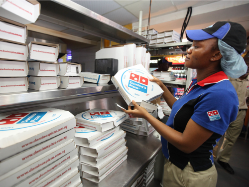 'The grass isn't always greener': Domino's CEO says the pizza is winning back delivery drivers from 'gig economy' rivals GrubHub and UberEats