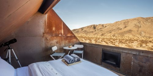 Two friends bought a rundown Joshua Tree property for $15,000 and turned it into an Airbnb complete with an open-air stargazing deck. See Inside.
