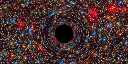 Most of the universe may be trapped inside of ancient black holes