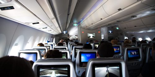 During a flight, I had to shield my son's eyes from a nude sex scene on-screen. The airline told me next time I should just change seats.