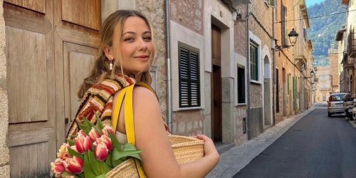 A 26-year-old influencer tried working from Mallorca for a month. She realized she can explore during the day and still keep East Coast hours.