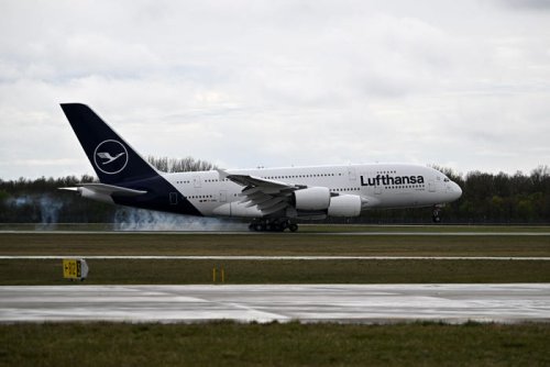 An arguing couple forced a Lufthansa A380 to divert after the husband reportedly threw food and tried to set fire to a blanket