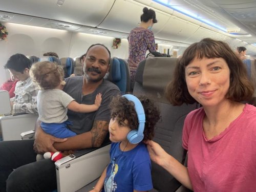 I took one of the world's longest flights with 2 toddlers. Here's what got me through it.
