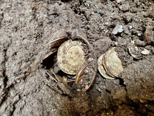 A couple laying a new kitchen floor dug up a trove of 264 rare gold coins that just sold at auction for $845,000