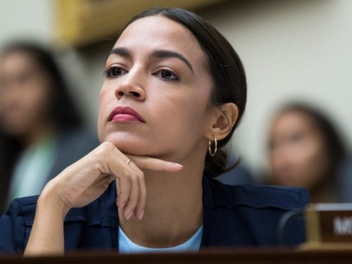 AOC says she's looking to trade in her Tesla for a union-made EV after clash with Elon Musk