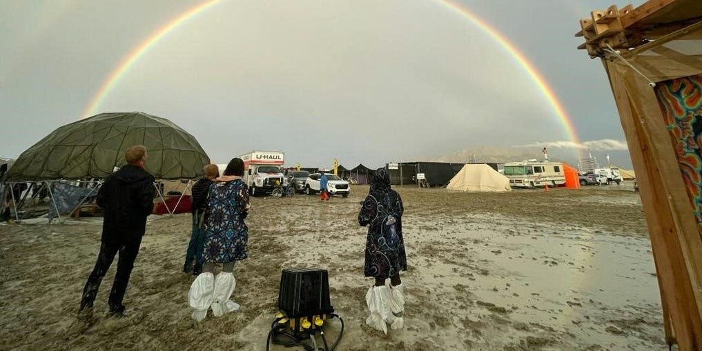 Photos show people stranded at Burning Man after a rainstorm turned the desert into a mud pit