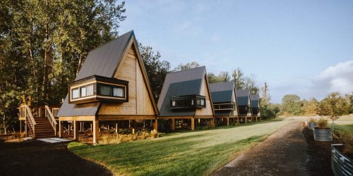 A couple started out renting a bedroom on Airbnb to pay the mortgage. Now their cabin village makes over $30,000 a month.