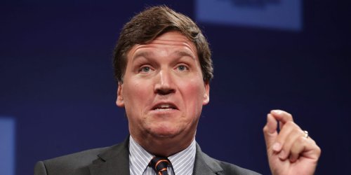 An artist raised $14,000 for abortion rights by selling an image of Tucker Carlson appearing with an unintentionally 'pro-choice' message on Fox News