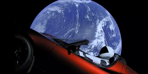 Elon Musk's Tesla and its 'Starman' driver just flew past Mars for the first time, 2 years after SpaceX launched the car into the void
