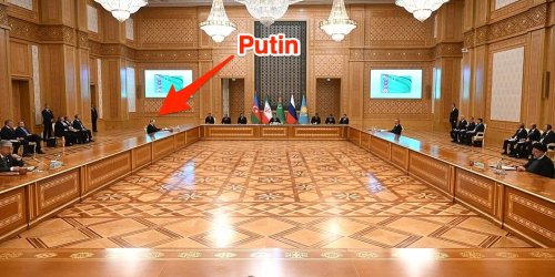 Putin's preposterously long table at Kremlin dwarfed by gigantic table at a summit he attended in Turkmenistan