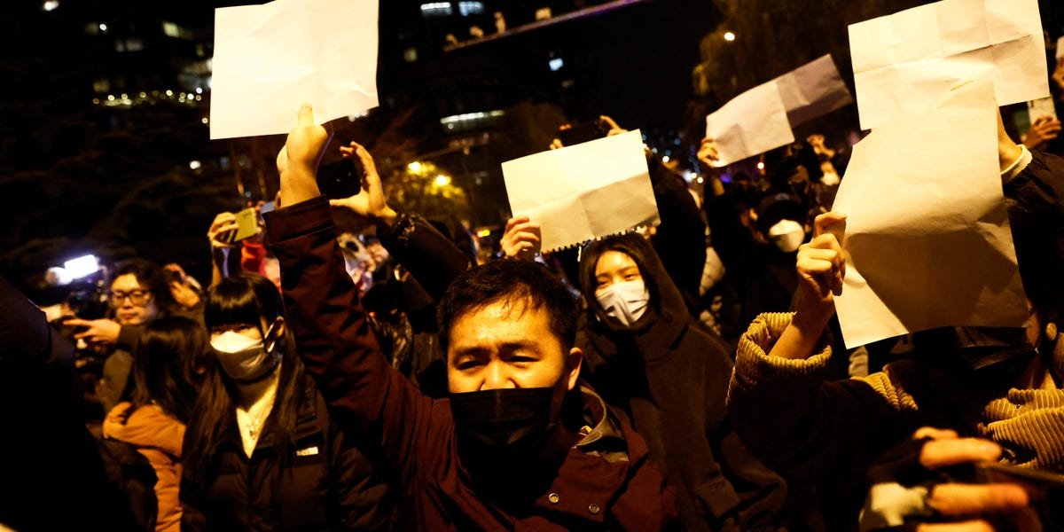 People are holding up blank white sheets of paper in China to protest COVID lockdowns. It's become a symbol of defiance against the Communist Party.